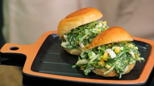 Fresh spring cabbage coleslaw sandwiches on a tray