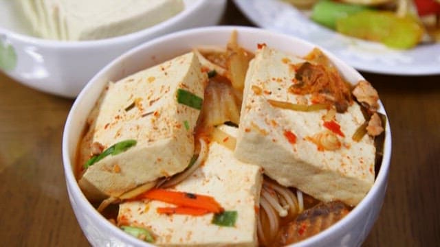 Korean Dining Table with Warm Soup and Rice