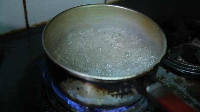 Instant noodles boiling in a pot