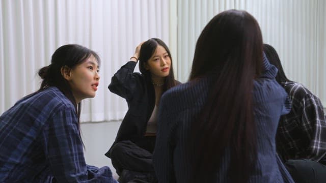 Friends Discussing Indoors