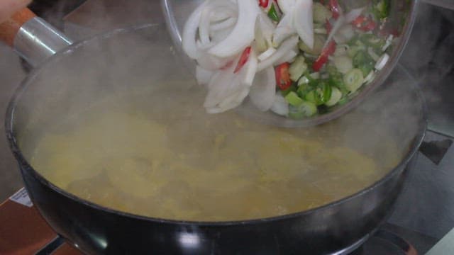 Hot Soup Being Cooked with Fresh Vegetables
