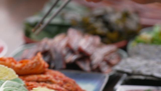 Ssam made with various vegetables served on a table