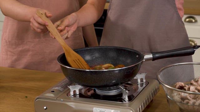 Add Octopus to Skillet for Cooking