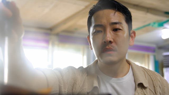 Man serving stew at a restaurant