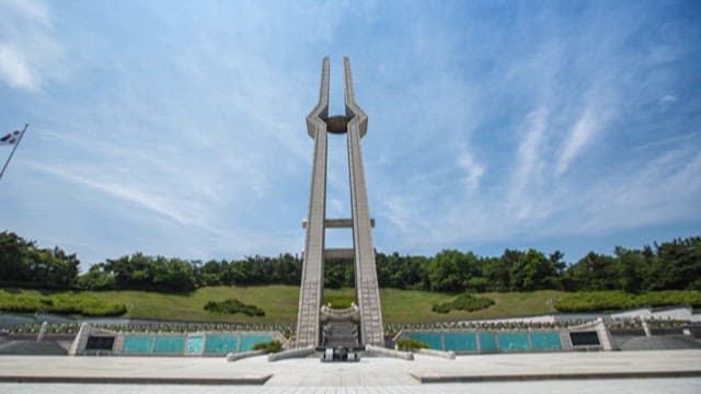 Memorial Stone in a Park Under Clear Skies
