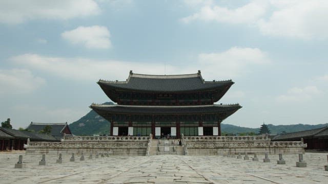 Gyeongbokgung Palace under a slightly cloudy sky