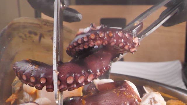 Spicy seafood stew containing various seafood