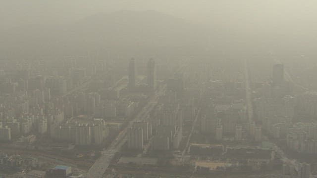 Skyline and Traffic in Urban Cityscape Seen through Haze Fog