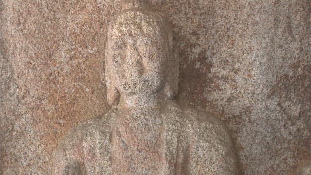 Detailed View of a Buddhist Stone Carved Statue