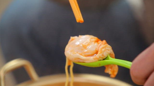 Wooden chopsticks for tearing a soft-boiled egg
