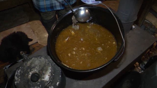 Serving Traditional Dish in a Rustic Setting