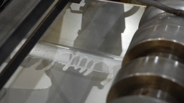 Liquid coating process on metal sheet