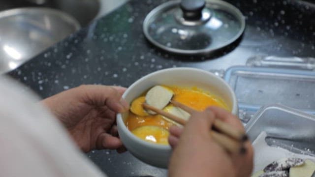 Making Eggplant Pancake in a Kitchen