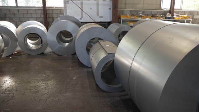 Steel coils in a factory setting