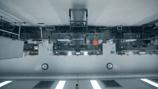 Autopsy room in a medical facility with stainless steel equipment