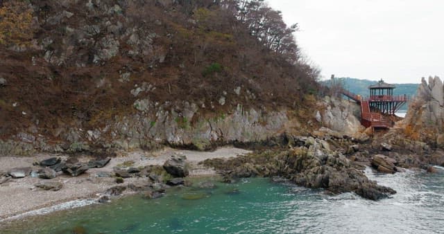 Coastal Walkway with Views of Rocky Peaks