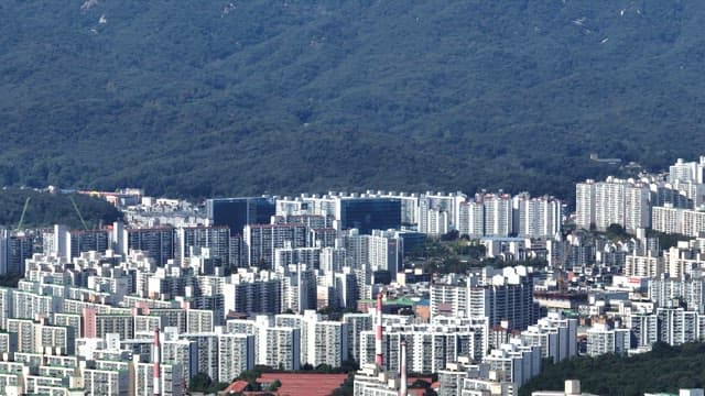 Buramsan mountain located behind an apartment complex