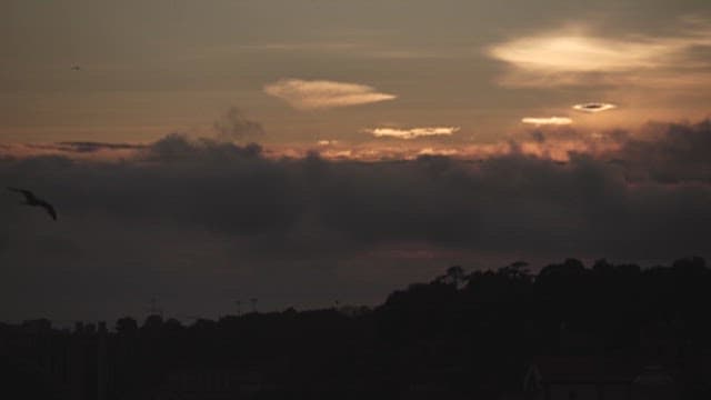 Sunset Sky with Clouds and Silhouette