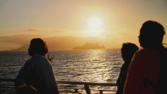 Sunset Watchers Overlooking the Ocean