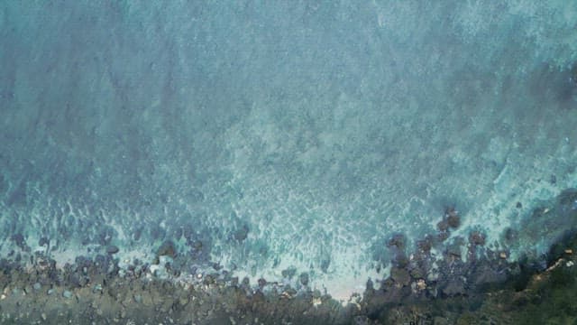 Waves crashing on the ocean surface