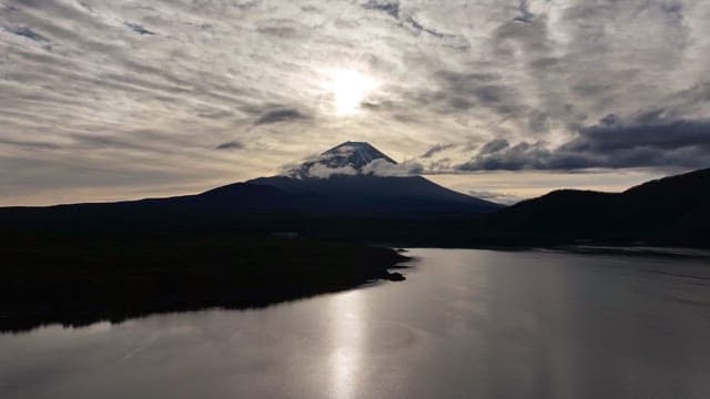 Mount Fuji silhouette with cloudy sky