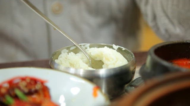 Spicy marinated crab dish with rice