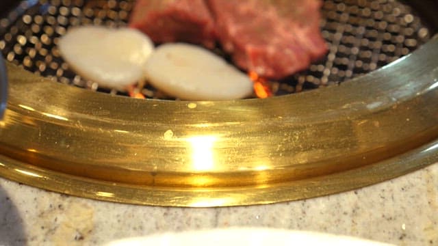 Grilled Meats Cooking on a Charcoal Grill