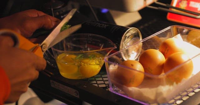 Preparing Eggs and Green Onion for Cooking