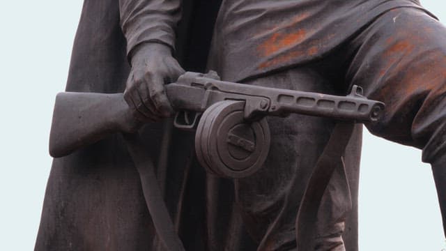 Statue holding a rifle