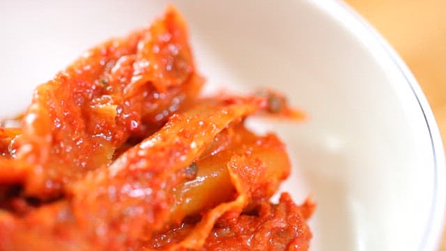 Kimchi in a white bowl