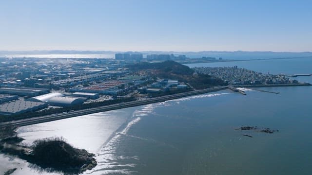 Coastal Cityscape with Industrial and Residential Areas