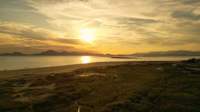 Sunset over a coastal landscape