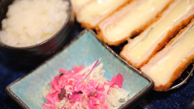 Plate of cheese donkatsu, rice, and salad