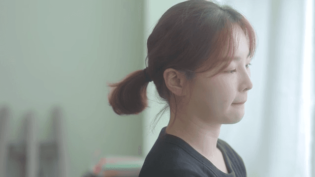 Woman with worried face indoors