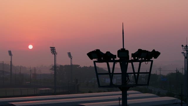 Sunset over an empty sports field