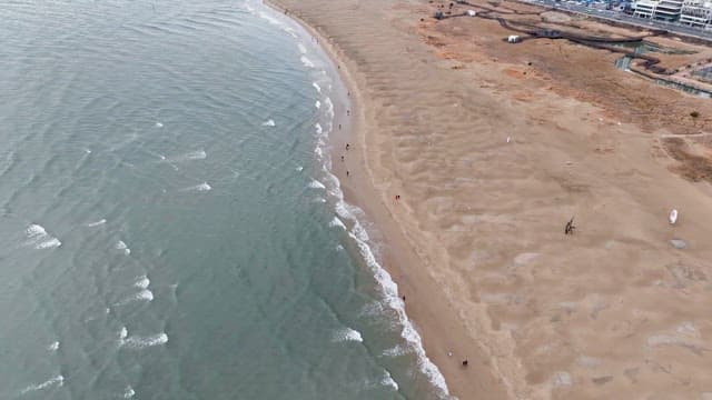 Vast beach with gentle waves