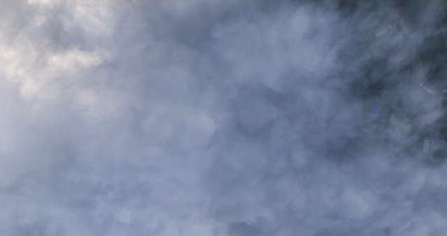 Clouds covering a landscape below