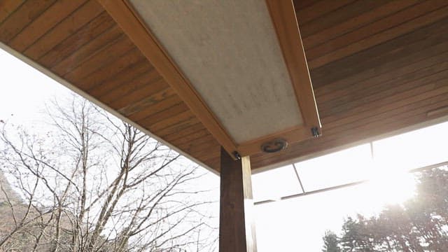 Wooden ceiling with sunlight streaming in
