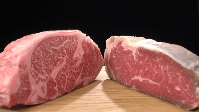Close-up of marbled beef on a wooden board