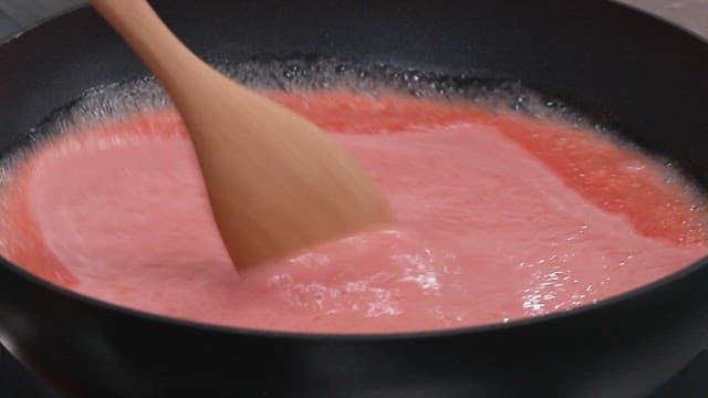 Tomato Juice and Sugar Heated in a Frying Pan