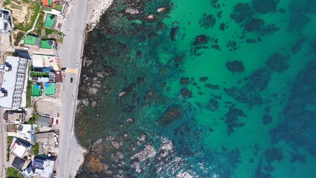 Coastal road and clear turquoise sea