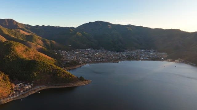 Tranquil lakeside village at dawn