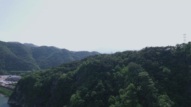 Lush Mountainous Landscape in Sunny Day