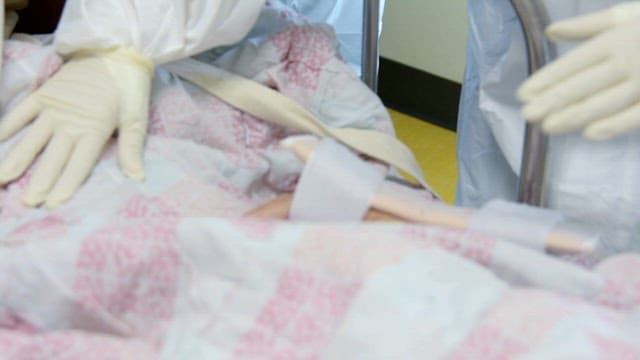 Medical Professional Checking the cCondition of a Patient