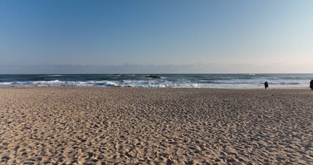 Serene Beachfront with Crashing Waves