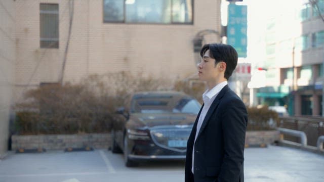 Man walking to building entrance