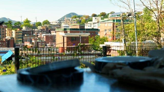 Panoramic view of the housing complex beyond the table