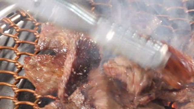 Sizzling beef on a grill