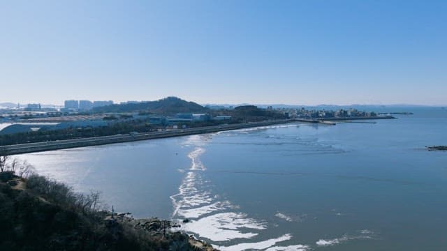 Coastal City by the Sea as Low Tide Approaches