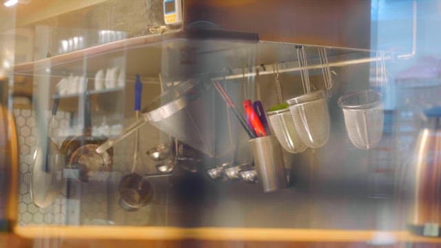 Kitchen with hanging utensils